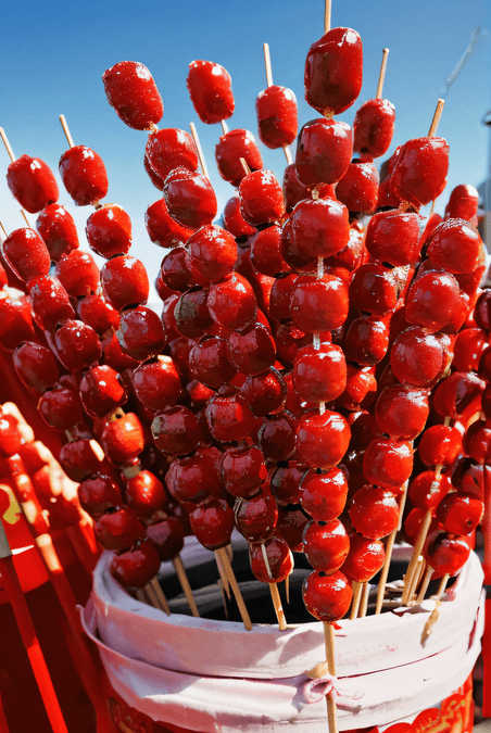 创意冬日美食红色冰糖葫芦春节过年摄影图