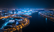 创意现代都市航拍城市建筑海边夜景