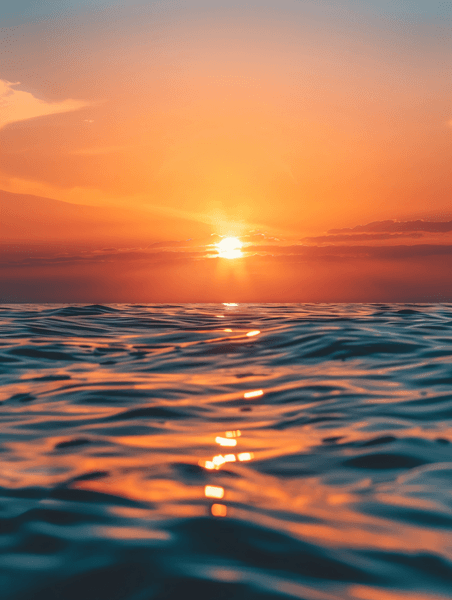 创意广阔大海上壮观日落大海夕阳海浪摄影图