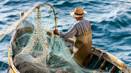 创意小船渔民农业捕捞职业人物描绘摄影照片