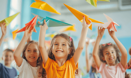 创意小学生一起扔纸飞机教育培训儿童节