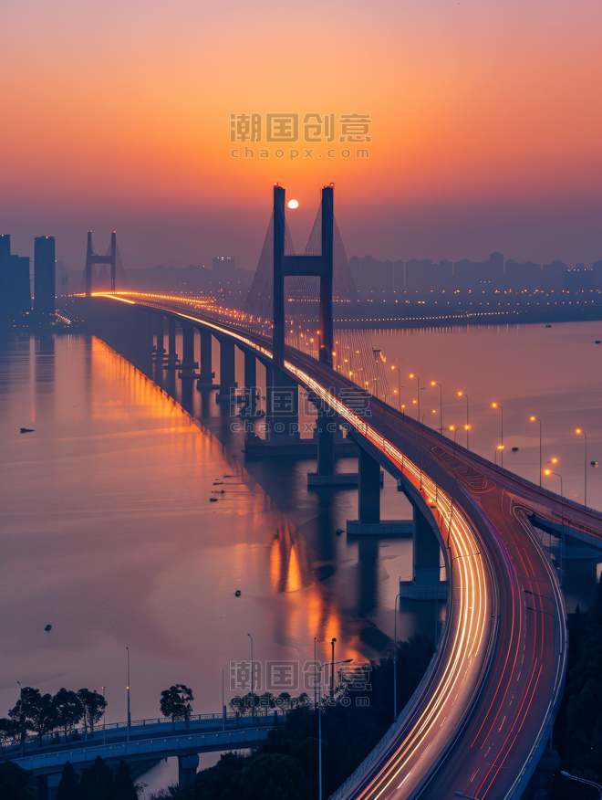 创意夕阳晚霞下的武汉鹦鹉洲大桥夜景